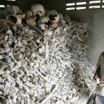 Cambodian Meo Soknen, 13, stands inside a small shrine full of human bones and skulls, all victims of the Khmer Rouge,  near her home Tuesday, March 31, 2009, in the Kandal Steung district of Kandal province, Cambodia.  Kaing Guek Eav, also know as "Duch", the commander of the infamous Toul Sleng prison, accepted responsibility Tuesday during the second day of a UN-backed tribual for torturing and executing thousands of inmates at Toul Sleng.  The small shrine, located 27 kilometers, (17 miles) south of Phnom Penh is one of many out of the way and forgotten monuments to the "Killing Fields."  (AP Photo/Heng Sinith)